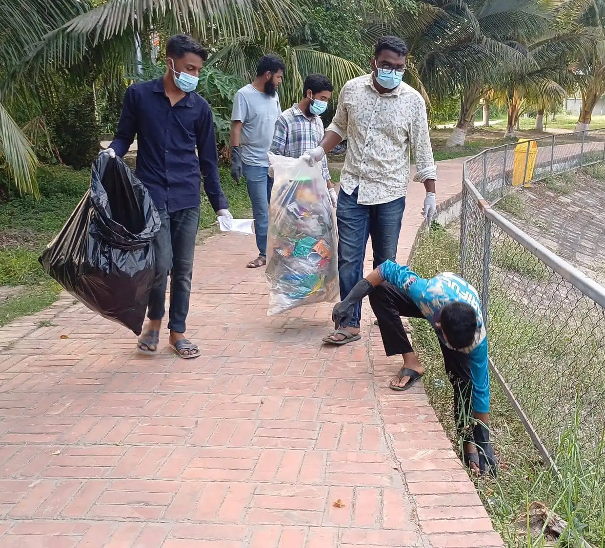 Volunteers collecting plastic waste